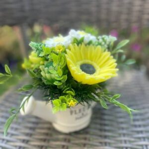 Small cute soap bouquet of sunflowers and daisies